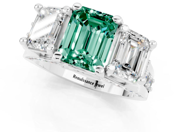 Platinum Emerald Cut Green Sapphire Three-Stone Ring with Channel Set Band and Four-Prong Setting