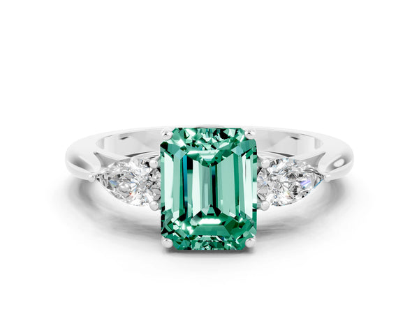 Platinum Emerald Cut Green Sapphire Three-Stone Ring with Pear  Side Stones and Prong Setting