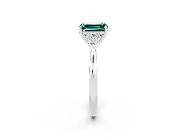 Platinum Emerald Cut Green Sapphire Three-Stone Ring with Pear  Side Stones and Prong Setting