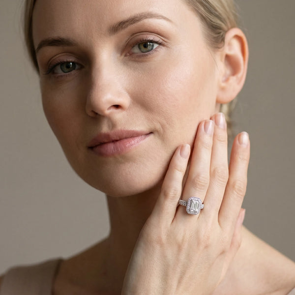 White gold Emerald Cut Halo Diamond Ring with Pavé Band and Four-Prong Setting