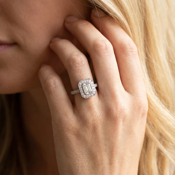 White gold Emerald-Cut Halo Diamond Ring with Pavé Band and Milgrain Prong Setting