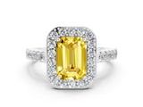 White gold Emerald Cut Halo Diamond Ring with Pavé Band and Three-Prong Setting