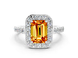 White gold Emerald Cut Halo Diamond Ring with Pavé Band and Three-Prong Setting