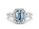 White gold Emerald Cut Halo Diamond Solitaire with Filigree Band and Four-Prong Setting