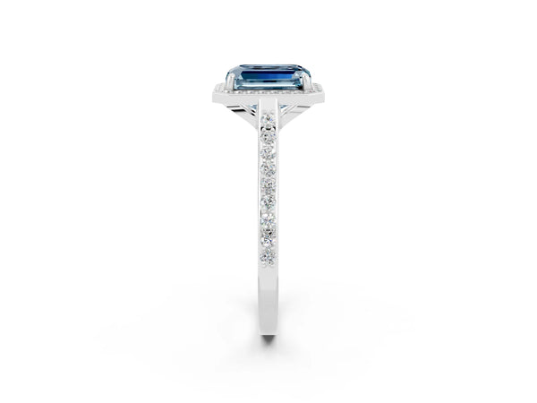 Platinum Emerald Cut Aquamarine Halo Engagement Ring with Round Pavé Shoulders and Prong Setting