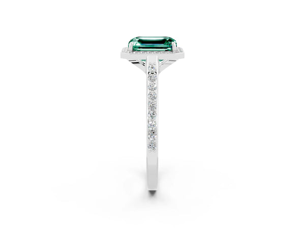 Platinum Emerald Cut Green Sapphire Halo Engagement Ring with Round Pavé Shoulders and Prong Setting