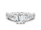 White gold Emerald Cut Moissanite Prong Setting with Side Stones on a Pave Band