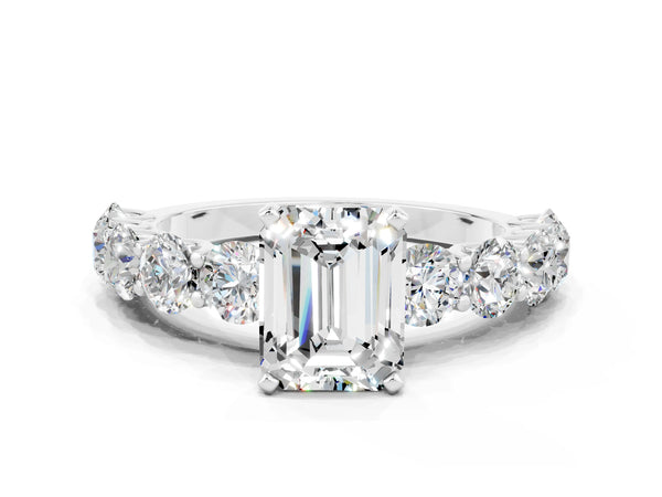 Platinum Emerald Cut Moissanite Prong Setting with Side Stones on a Pave Band