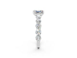 White gold Emerald Cut Moissanite Prong Setting with Side Stones on a Pave Band_2