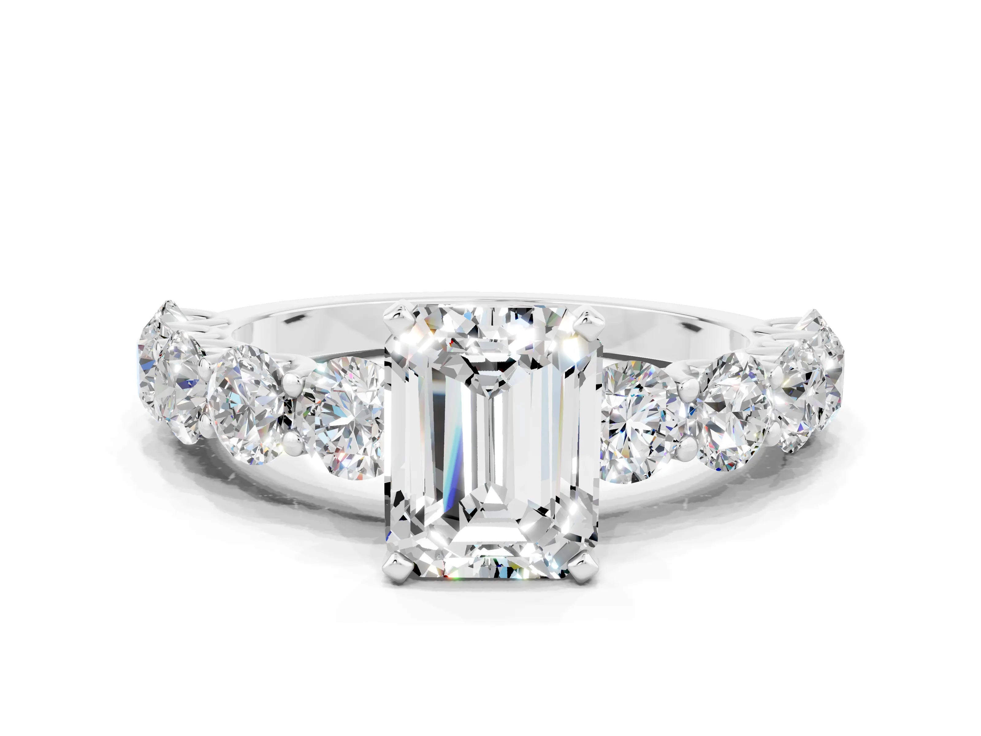 White gold Emerald Cut Moissanite Prong Setting with Side Stones on a Pave Band
