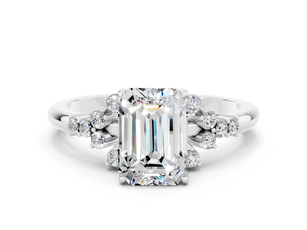 Platinum Emerald Cut Moissanite Ring with Side Stones and Four-Prong Setting