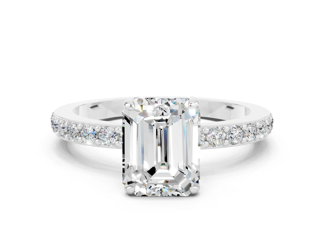 White gold Emerald Cut Moissanite Solitaire Engagement Ring with Pavé Band and Four-Prong Setting