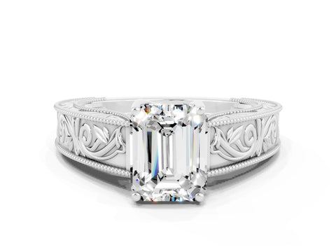 White gold Emerald Cut Moissanite Solitaire Ring with Engraved Band and Four-Prong Setting