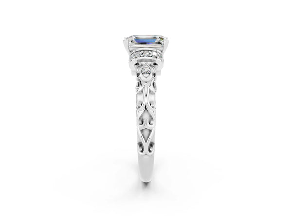 Platinum Emerald Cut Moissanite Solitaire Ring with Filigree Band and Four-Prong Setting
