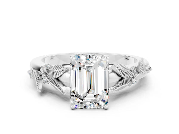 Platinum Emerald Cut Moissanite Solitaire Ring with Leaf Motif Band and Four-Prong Setting