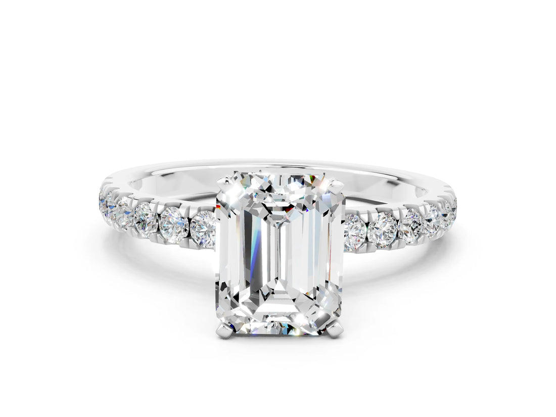 White gold Emerald Cut Moissanite Solitaire Ring with Pavé Accents and Four-Prong Setting