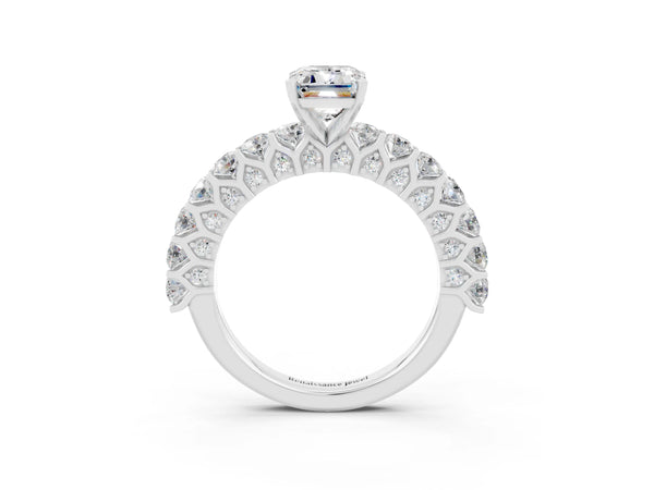 Platinum Emerald Cut Moissanite Solitaire Ring with Shared Prong Pavé Band and Four-Prong Setting