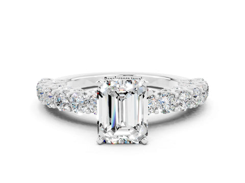 White gold Emerald Cut Moissanite Solitaire Ring with Shared Prong Pavé Band and Four-Prong Setting