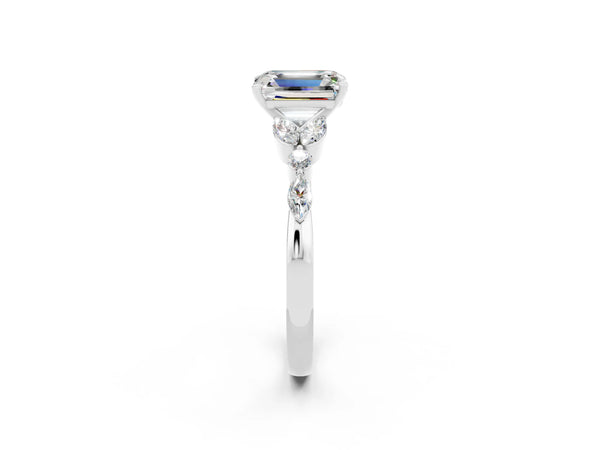 Platinum Emerald Cut Moissanite Solitaire Ring with Side Stones and Four-Prong Setting