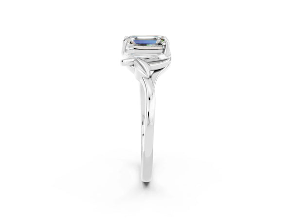 Platinum Emerald Cut Moissanite Solitaire Ring with Twist Band and Four-Prong Setting