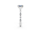 White gold Emerald Cut Moissanite Solitaire with Side Stones on a Pavé Band and Four-Prong Setting_2