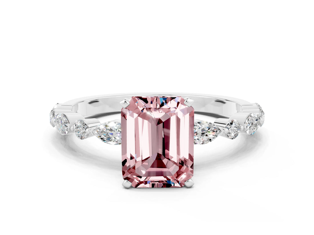 White gold Emerald Cut Morganite Solitaire with Side Stones on a Pavé Band and Four-Prong Setting
