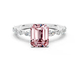 White gold Emerald Cut Morganite Solitaire with Side Stones on a Pavé Band and Four-Prong Setting