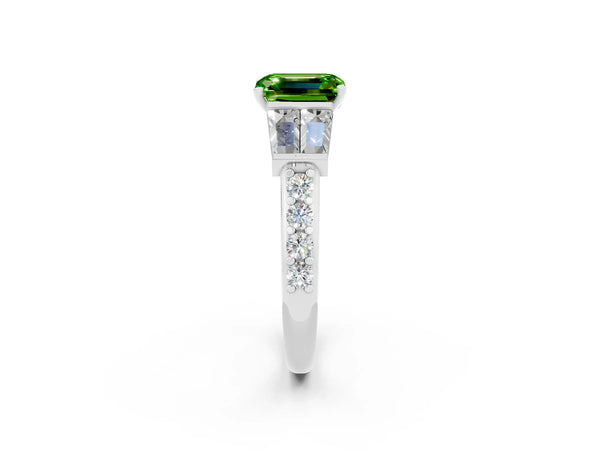 Platinum Emerald Cut Peridot Engagement Ring with Baguette Side Stones and Channel Set Band