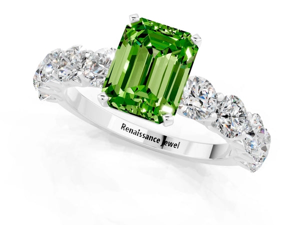 White gold Emerald Cut Peridot Prong Setting with Side Stones on a Pave Band