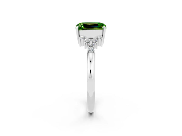 Platinum Emerald Cut Peridot Ring with Side Stones and Four-Prong Setting