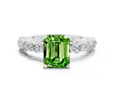 White gold Emerald Cut Peridot Side Stone Solitaire Ring with Round  and Four-Prong Setting_60