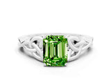 White gold Emerald Cut Peridot Solitaire Engagement Ring with Celtic Knot Band and Four-Prong Setting