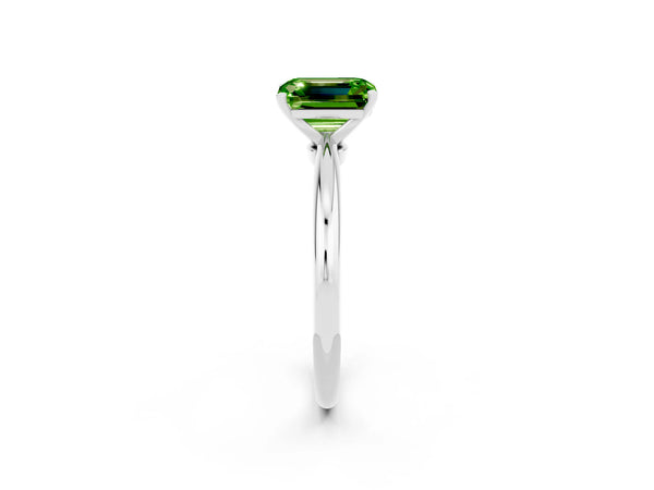 Platinum Emerald Cut Peridot Solitaire Ring with Six-Prong Setting and Classic Band
