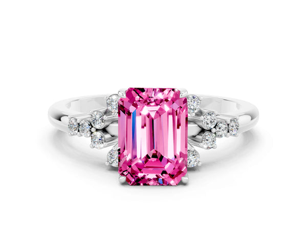 Silver Emerald Cut Pink Sapphire Ring with Side Stones and Four-Prong Setting