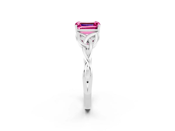 White gold Emerald Cut Pink Sapphire Solitaire Engagement Ring with Celtic Knot Band and Four-Prong Setting