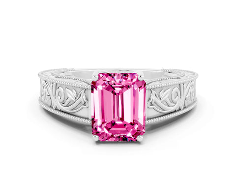White gold Emerald Cut Pink Sapphire Solitaire Ring with Engraved Band and Four-Prong Setting