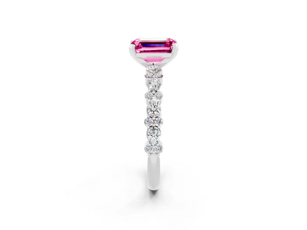 Platinum Emerald Cut Pink Sapphire Side Stone Solitaire Ring with Round  and Four-Prong Setting