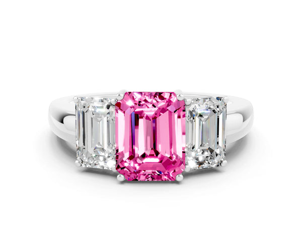 Platinum Emerald Cut Pink Sapphire Three-Stone Ring with Four-Prong Setting and Classic Band