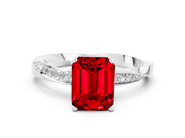 White gold Emerald Cut Ruby Engagement Ring with Side Stone Accents and Four-Prong Setting