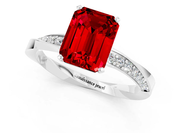 White gold Emerald Cut Ruby Engagement Ring with Side Stone Accents and Four-Prong Setting