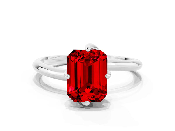 Silver Emerald Cut Ruby Solitaire Engagement Ring with Four-Prong Setting and Classic Band