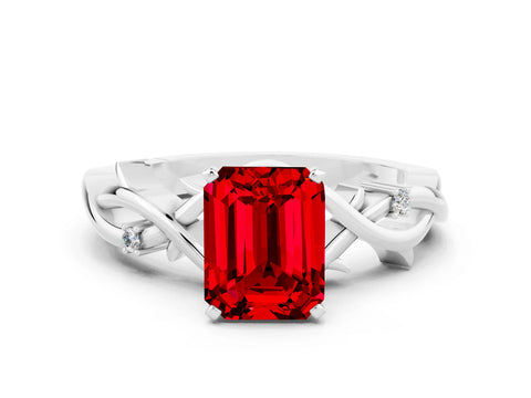 White gold Emerald Cut Ruby Solitaire Ring with Twisted Band and Prong Setting