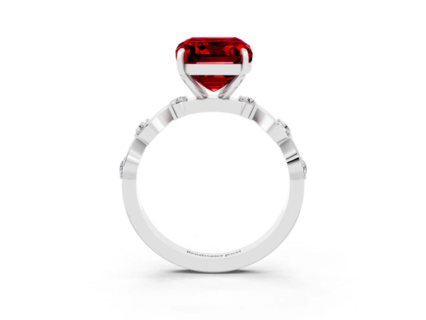 Platinum Emerald Cut Ruby Solitaire Twisted Band with Round  Accents and Prong Setting