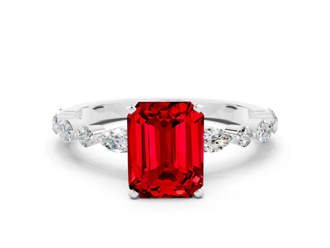 White gold Emerald Cut Ruby Solitaire with Side Stones on a Pavé Band and Four-Prong Setting