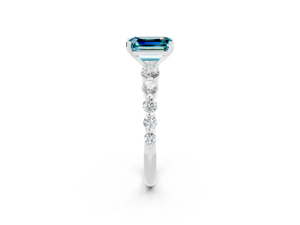 White gold Emerald Cut Solitaire Blue Topaz Ring with Pave Band and Four-Prong Setting