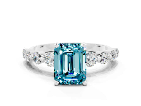 White gold Emerald Cut Solitaire Blue Topaz Ring with Pave Band and Four-Prong Setting