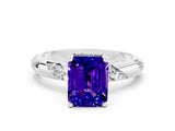 White gold Emerald Cut Solitaire Diamond Engagement Ring with Twisted Pave Band and Four-Prong Setting