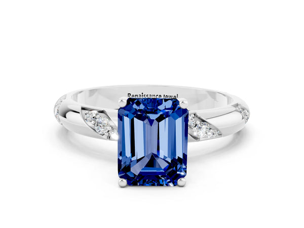 Platinum Emerald Cut Blue Sapphire Solitaire Engagement Ring with Twisted Round  Accent Band and Prong Setting