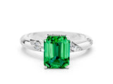 White gold Emerald Cut Solitaire Diamond Engagement Ring with Twisted Pave Band and Four-Prong Setting