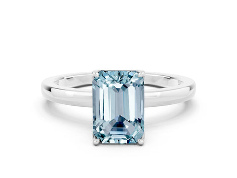 White gold Emerald Cut Solitaire Diamond Ring with Thin Band and Four-Prong Setting